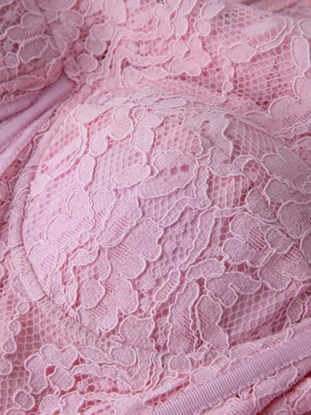 Pink lace long-sleeve midi dress, fabric close-up.