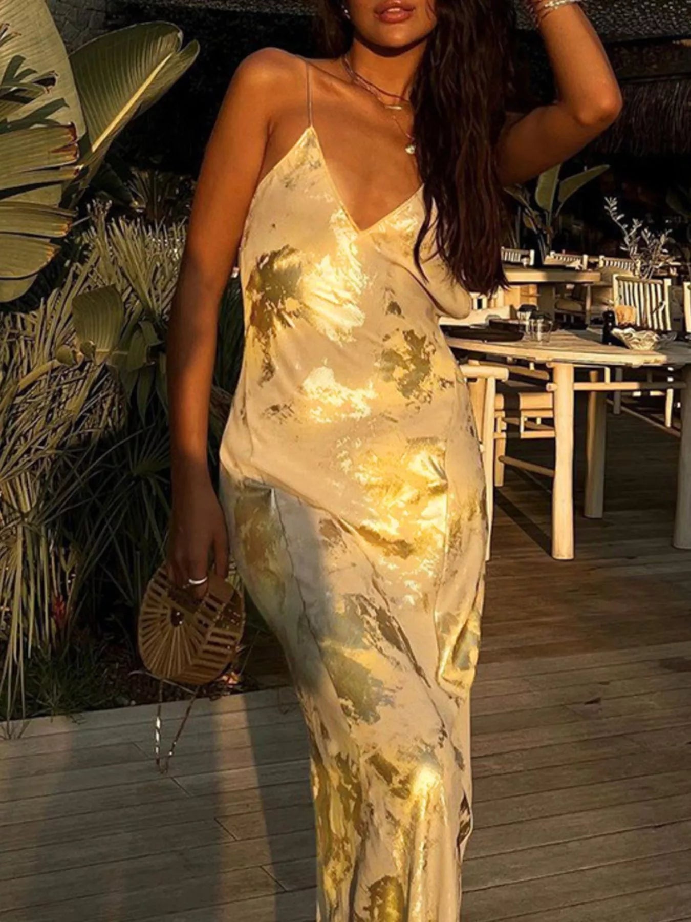 Gold V-neck maxi dress side view