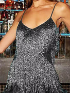 Black plus-size sequin feather-fringe mini dress, neckline detail.